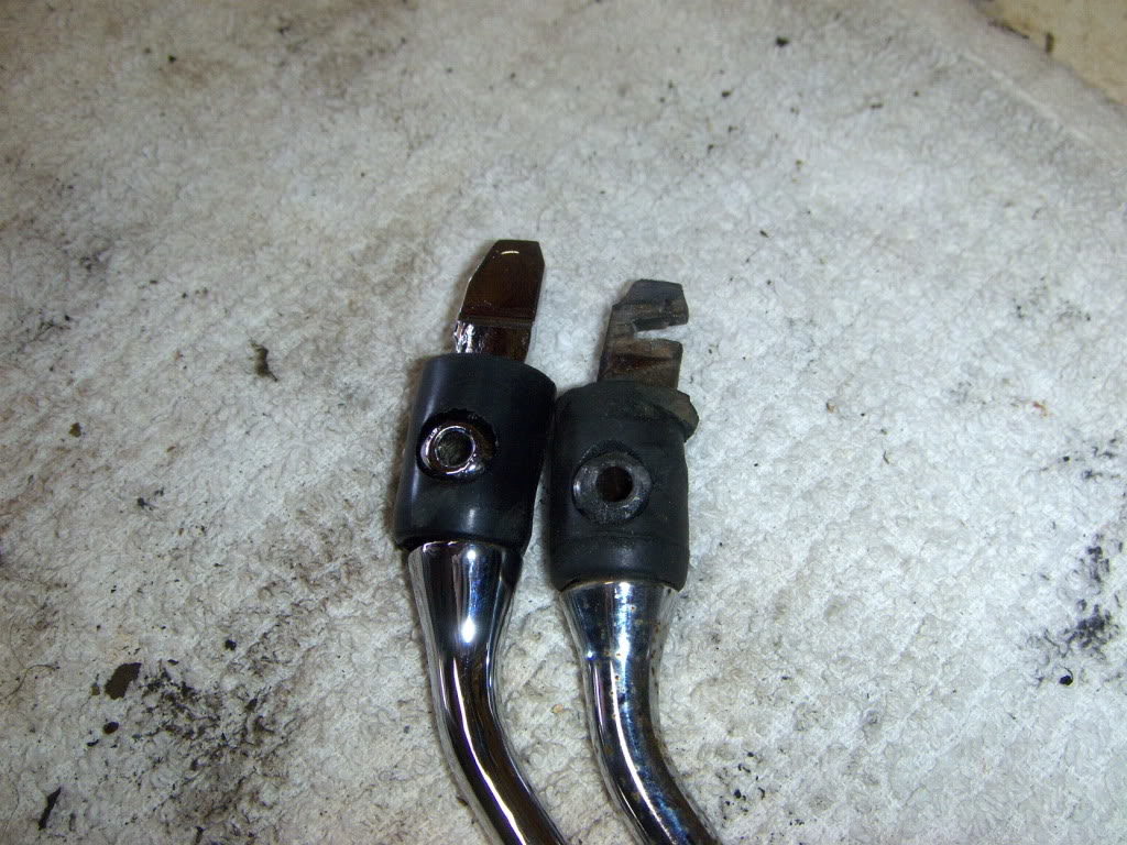 Most old shifters don't seem to have a notch that deep. Someone in the past had shimmed the detent plate as a temporary fix.