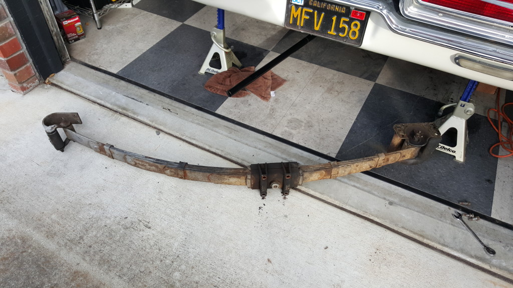 The passenger side leaf spring, liberated.